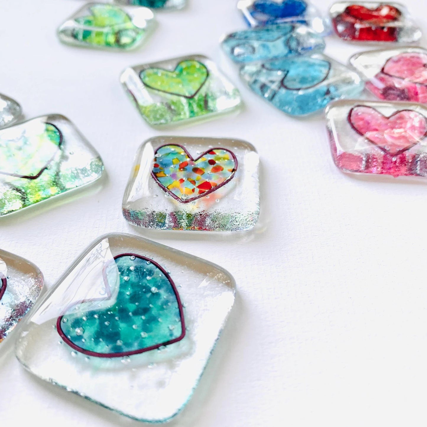 Fused glass heart pocket hug token.