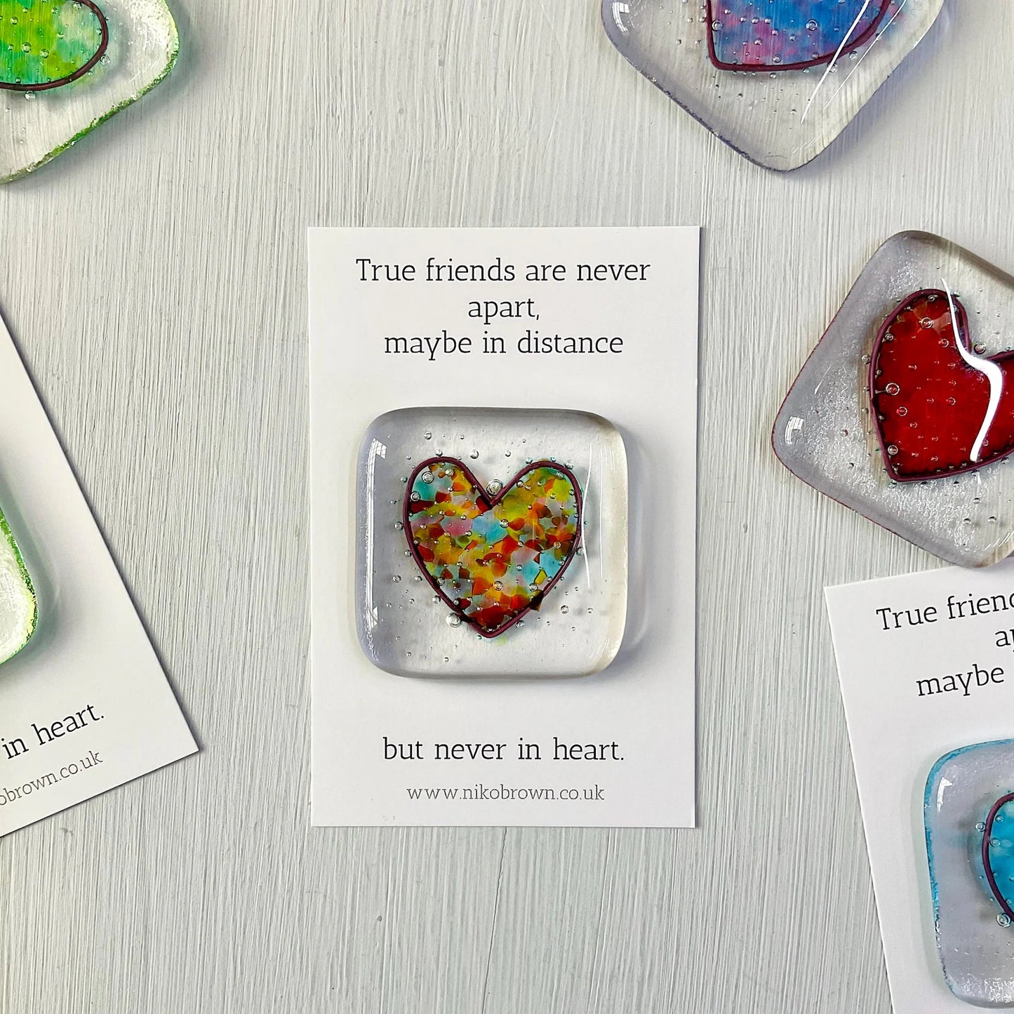 Fused glass heart pocket hug token.